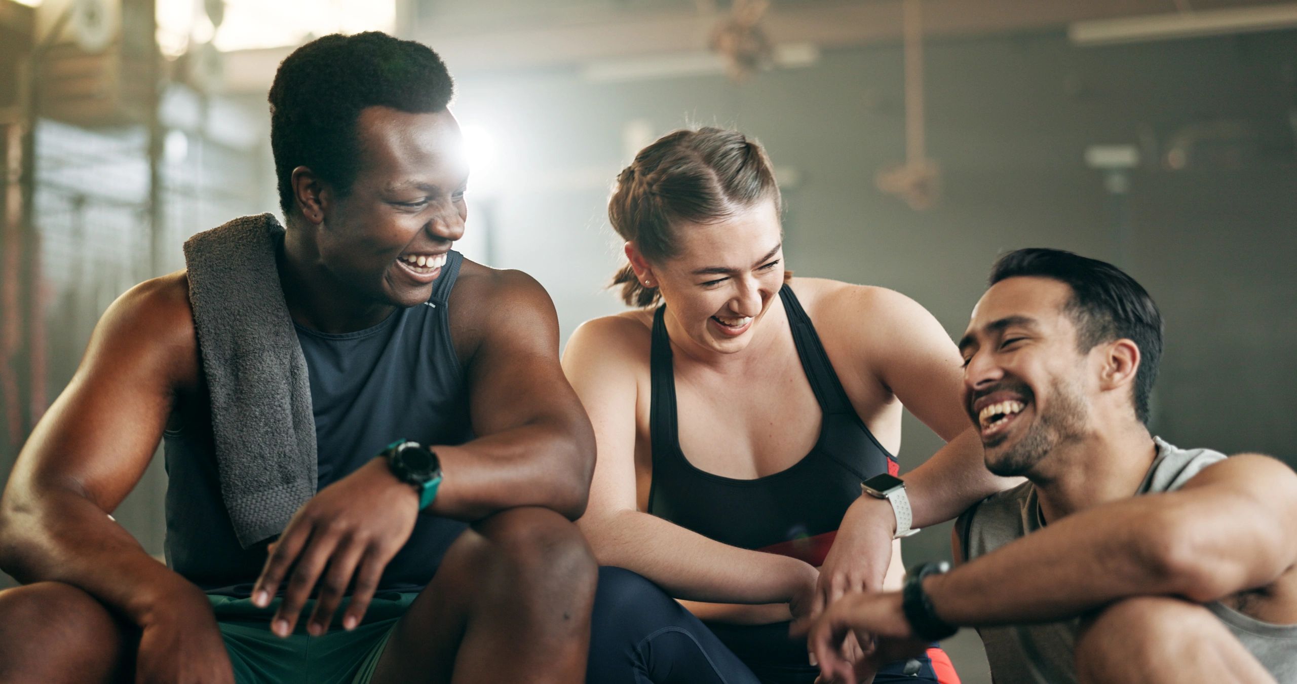 Fitness, group and laughing in gym with confidence,